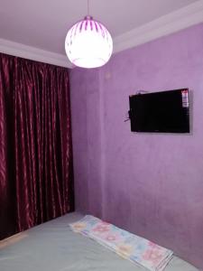 TV a/nebo společenská místnost v ubytování Mohammed V Airport Appartment