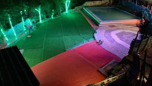 an overhead view of a swimming pool at night at CAMPSITE in Shivpuri