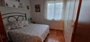 Posteľ alebo postele v izbe v ubytovaní VILLA EN DENIA CON VISTAS AL MEDITERRANEO