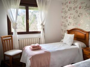 Postel nebo postele na pokoji v ubytování Finca La Cuesta