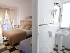 Postel nebo postele na pokoji v ubytování Hotel Finlandia