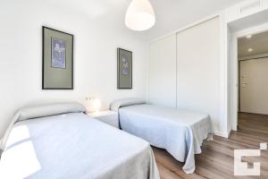 Posteľ alebo postele v izbe v ubytovaní Apartamento Isea 153 - Grupo Turis