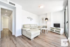Televízia a/alebo spoločenská miestnosť v ubytovaní Apartamento Isea 153 - Grupo Turis