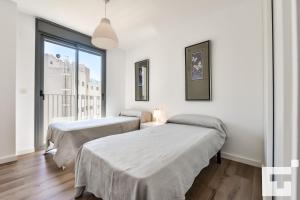 Posteľ alebo postele v izbe v ubytovaní Apartamento Isea 153 - Grupo Turis