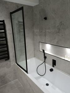 Koupelna v ubytování Apartament 3 Maja 4