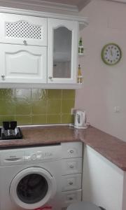 Kuchyň nebo kuchyňský kout v ubytování Costamarina Apartments