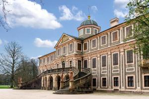 a large building with a staircase in front of it at Cheng in Baden-Baden