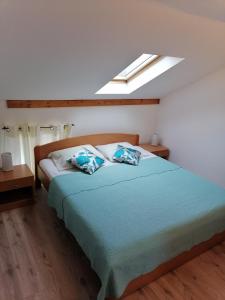 Posteľ alebo postele v izbe v ubytovaní Apartments Vicko Vodnica