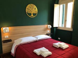 Postel nebo postele na pokoji v ubytování Il Piccolo Albergo Matera
