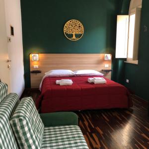 Postel nebo postele na pokoji v ubytování Il Piccolo Albergo Matera