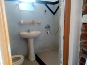 Koupelna v ubytování Nimsara Homestay