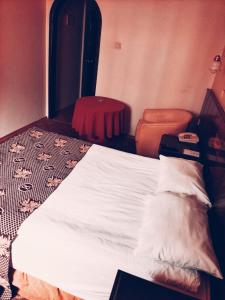 Postel nebo postele na pokoji v ubytování SPOR HOTEL