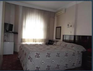 Postel nebo postele na pokoji v ubytování SPOR HOTEL