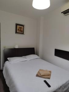 En eller flere senge i et værelse på A G Studio's Palas-Iasi 2