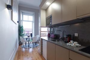 Kuchyň nebo kuchyňský kout v ubytování Luxury House Downtown Porto