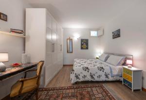 A bed or beds in a room at Il Nido del Canterino