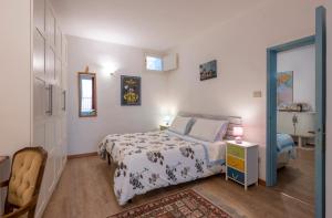 A bed or beds in a room at Il Nido del Canterino