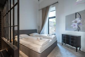 Posteľ alebo postele v izbe v ubytovaní easy flat Augarten
