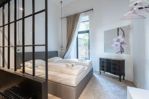 Posteľ alebo postele v izbe v ubytovaní easy flat Augarten