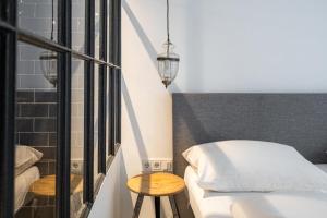 Posteľ alebo postele v izbe v ubytovaní easy flat Augarten