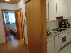 Dapur atau dapur kecil di ciao-aschau Grenzhub FeWo 312 Göke +5 gambar