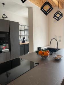 Kuchyň nebo kuchyňský kout v ubytování Home Paradise
