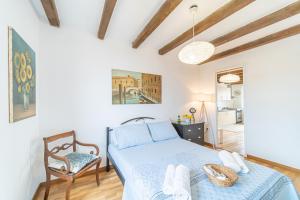 Ένα ή περισσότερα κρεβάτια σε δωμάτιο στο Contessa di Corfu ii