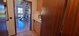 Kuchyň nebo kuchyňský kout v ubytování ciao-aschau Gschwendtnerhof Ap18 SchölzkeV