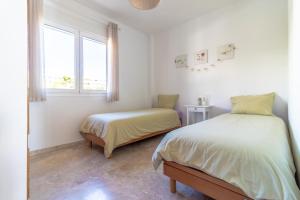 Postel nebo postele na pokoji v ubytování Casa Roan