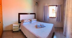 En eller flere senge i et værelse på Ingleses norte da ilha