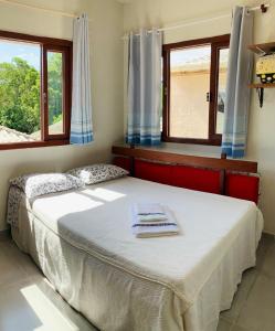 En eller flere senge i et værelse på Ingleses norte da ilha