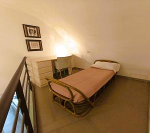 A bed or beds in a room at Villetta Marianna