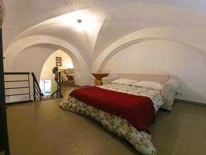 A bed or beds in a room at Villetta Marianna