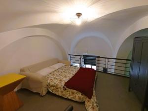 A bed or beds in a room at Villetta Marianna