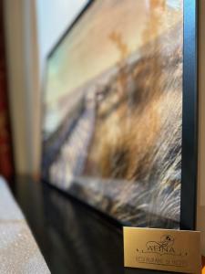 TV a/nebo společenská místnost v ubytování Gasthaus AFINA
