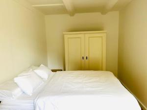 Katil atau katil-katil dalam bilik di Stylisches Haus mit Garten in zentraler Lage