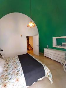 A bed or beds in a room at Villetta Marianna