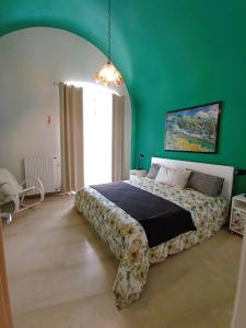 A bed or beds in a room at Villetta Marianna