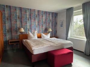 Postel nebo postele na pokoji v ubytování Gasthaus AFINA