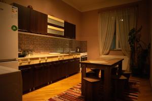 Kuchyň nebo kuchyňský kout v ubytování Guesthouse Hillside + 37 fotografií