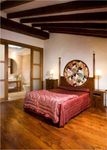a bedroom with a large bed in a room at Art Boutique Hotel Chamarel in Denia