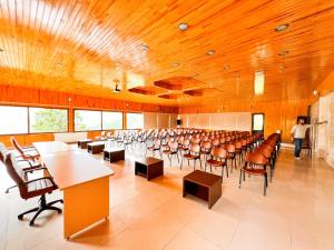 a large room with rows of tables and chairs at Lahza Hills Resort in Çaykara