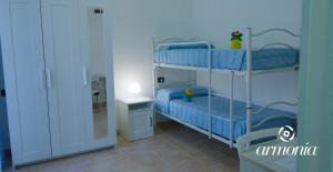 Postel nebo postele na pokoji v ubytování B&B Armonia Vieste + 17 fotografií