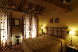 Postel nebo postele na pokoji v ubytování Posada el Zaguan + 28 fotografií
