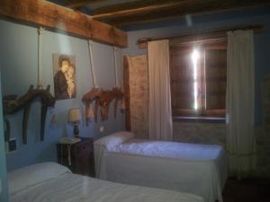 Postel nebo postele na pokoji v ubytování Posada el Zaguan