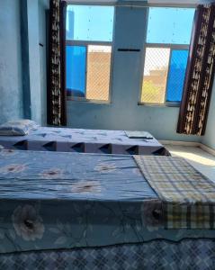 Voodi või voodid majutusasutuse JSR Boys Hostel - Malviya Nagar toas