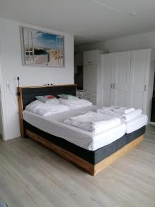 Ein Bett oder Betten in einem Zimmer der Unterkunft SPO - gemütliches Apartment - TOP LAGE