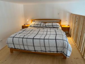 Postel nebo postele na pokoji v ubytování Apartmán v Lesní
