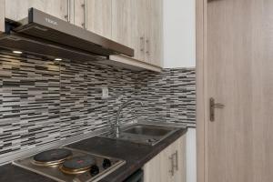 Kuchyň nebo kuchyňský kout v ubytování Aspa's House + 36 fotografií