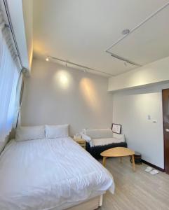 Postelja oz. postelje v sobi nastanitve 寓樂居